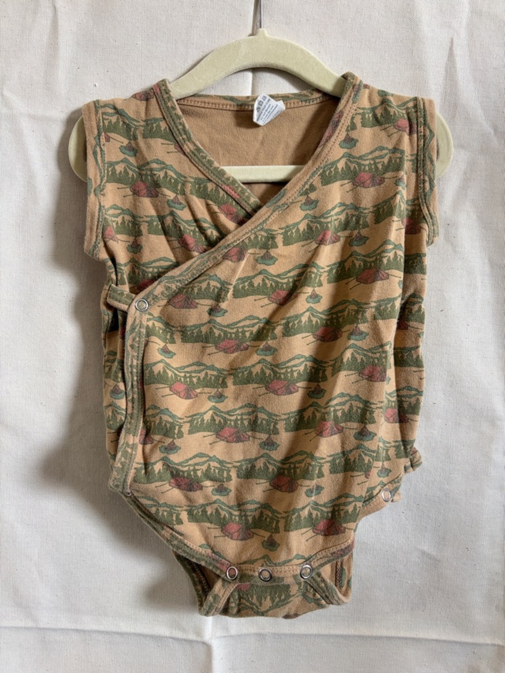 kate quinn tent wrap bodysuit